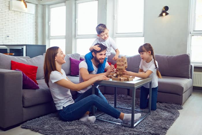 Happy family playing board games